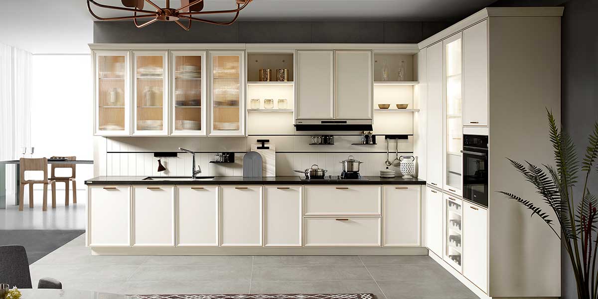 cream cabinets with black countertop