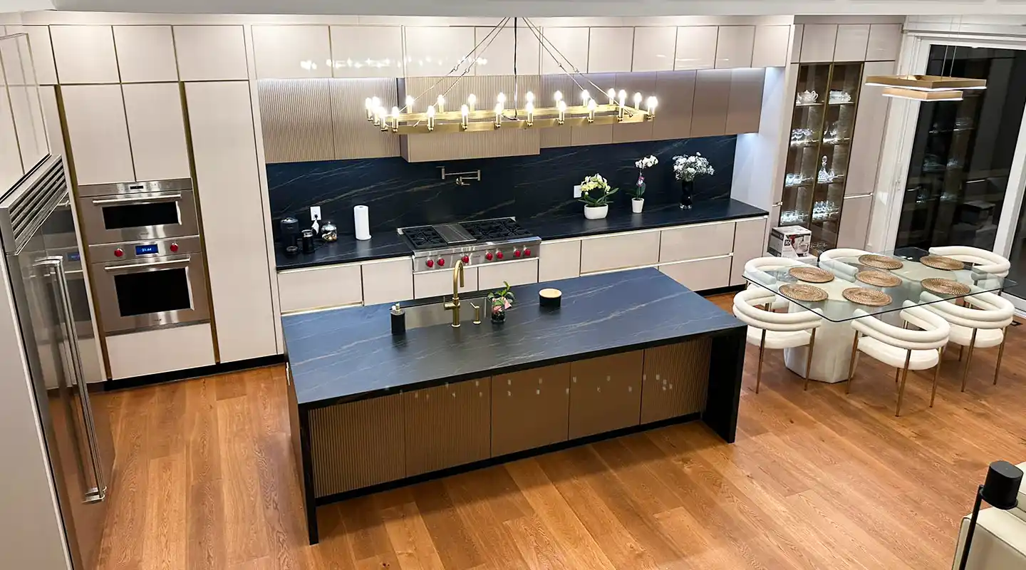 off white modern kitchen with black countertop